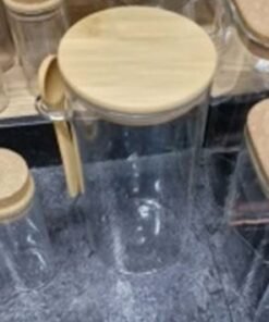 Stiklinis indas su mediniu dangteliu ir šaukšteliu